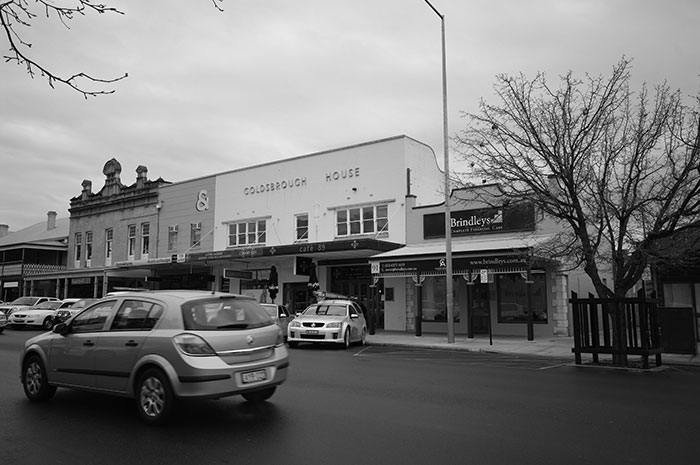 Brindleys' storefront in greyscale